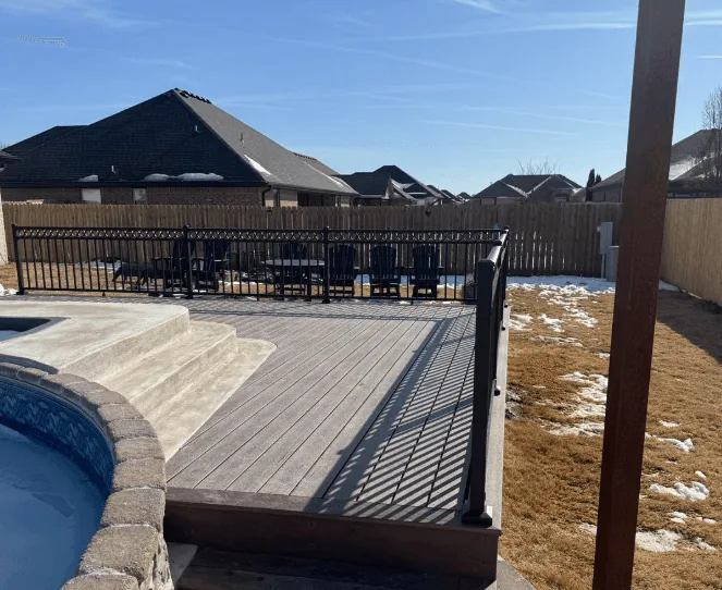 TimberTech composite deck with black aluminum railing — JHG Contracting LLC serving Gravette, AR