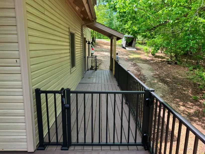 TimberTech composite deck with stairs and wood-grain finish — JHG Contracting LLC serving Gentry, AR
