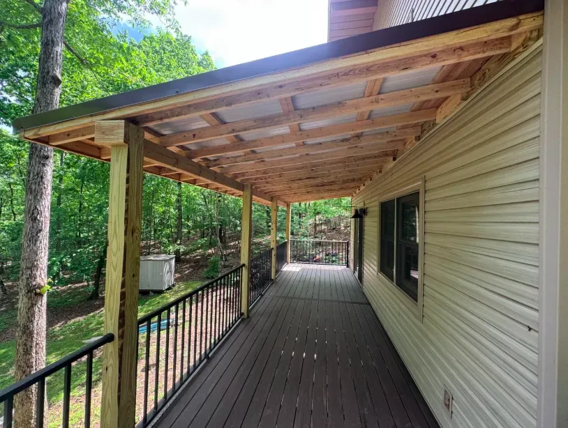 376 sq ft TimberTech composite deck with metal porch roof Fayetteville AR — JHG Contracting LLC